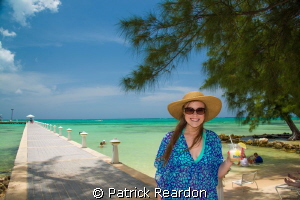 Taking a break from diving.  Daughter at Rum Point, Grand... by Patrick Reardon 